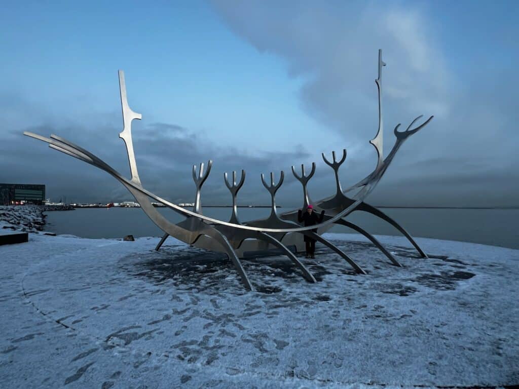 Art depicting a traditional Icelandic Boat in the snow. This is a popular sight on a tour of Iceland.