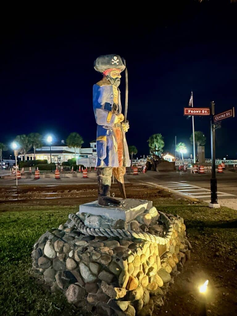 Evening downtown Amelia Island with a pirate statue at the harbourside