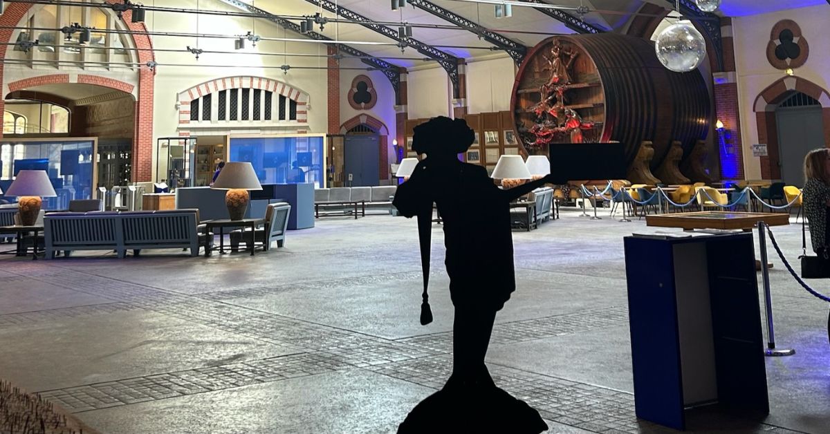 Reception area at Vranken Pommery with seats for guests to taste champagne and modern art displays.