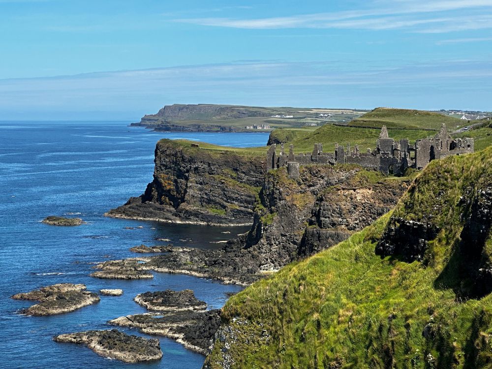 Wild rugged coastline of Northern Ireland with cliffs down to the sea.