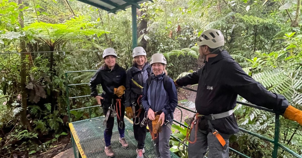 People waiting on a platform to zipline in Monteverde.