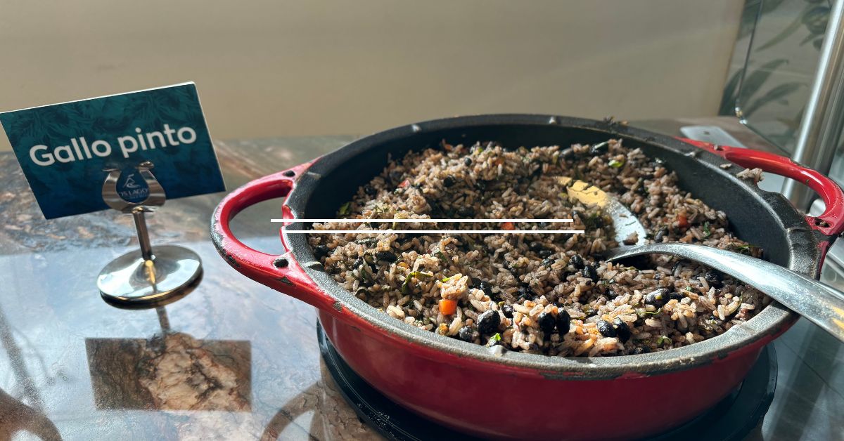 Pan of food. There is a label next to it naming the food as Gallo Pinto a rice dish of Costa Rica
