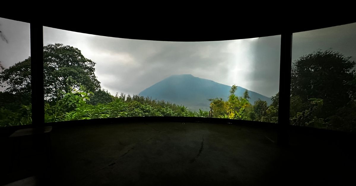 360 degree screen showing Volcanoes National Park Gorilla film.
