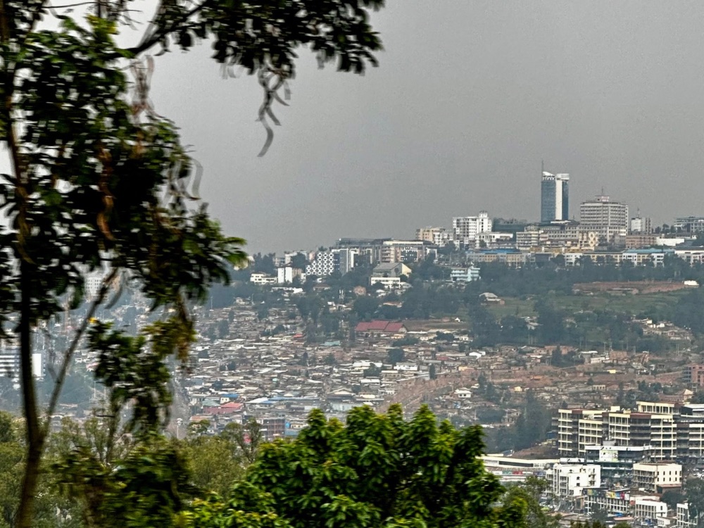 View of Kigali Rwanda shows expanse of city over hills and valleys.