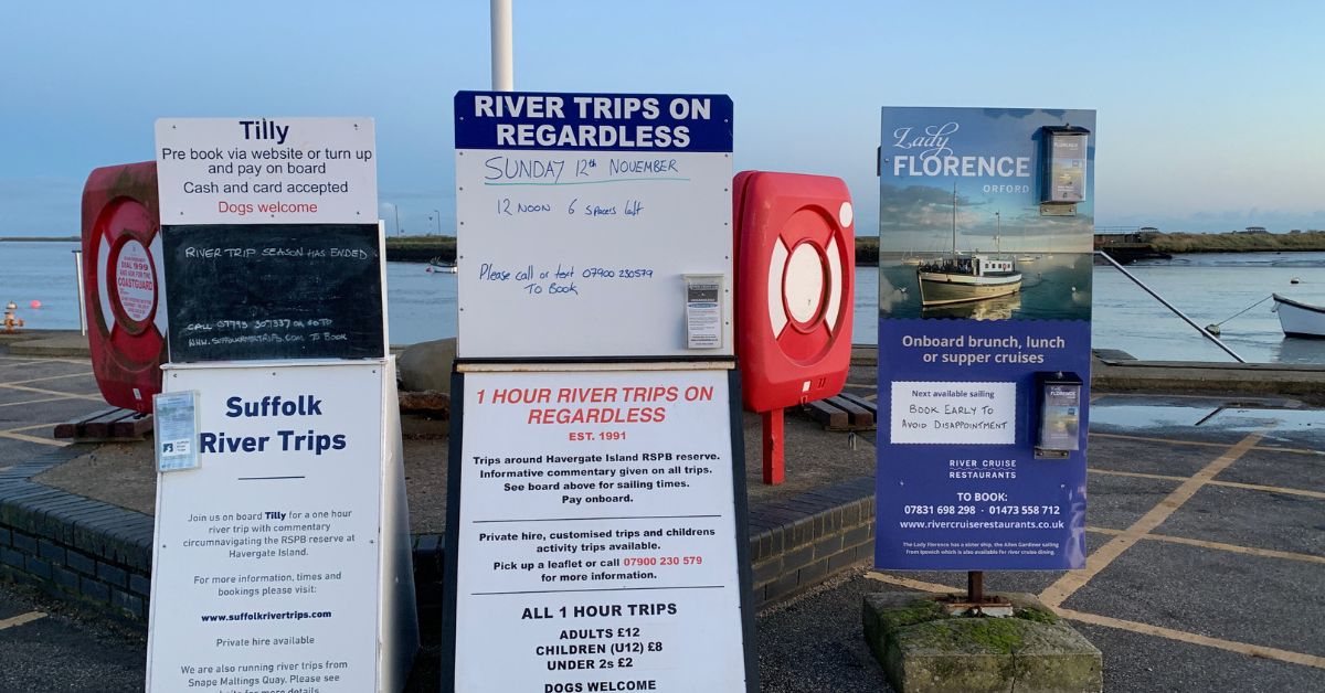 Signs at Orford Quay about River Trips