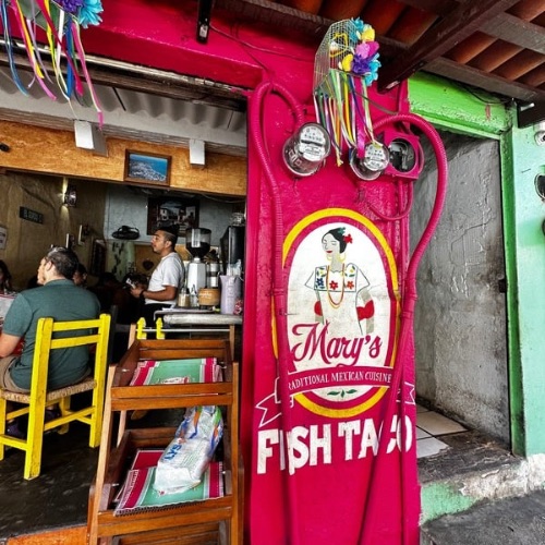 Sign advertising Fish Tacos restaurant.