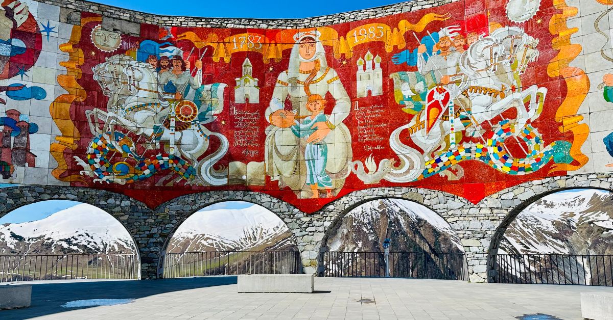 Large fresco with multicolored images depicting friendship between Georgia and neighboring country Russia.