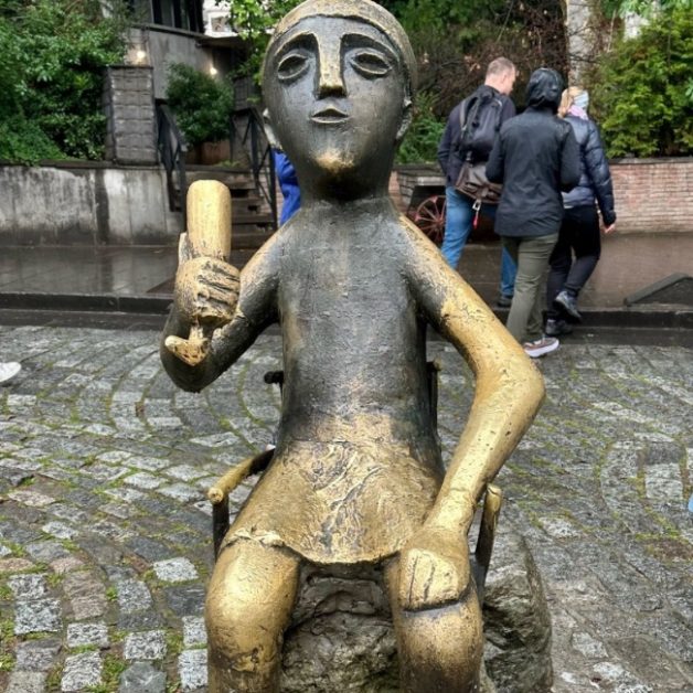 A bronze statue of a Georgian Tamada, known as a toastmaster in Georgia culture.