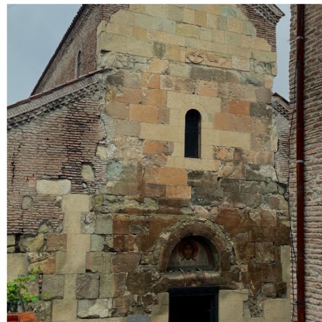 Stone exterior and entrance of the ancient Anchiskhati Church in Old Town Tbilisi.