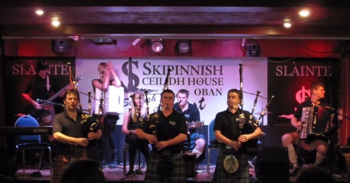 A Scottish Pipe Band playing in Oban .